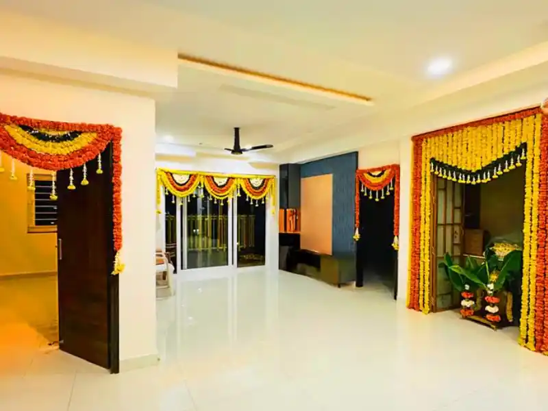 Griha pravesh flower decoration with marigold toran in Kolkata