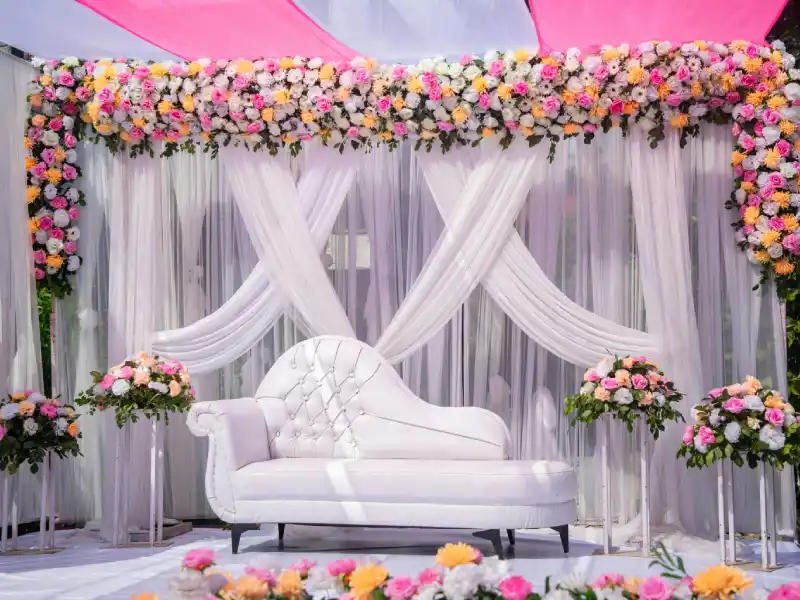 Floral arch wedding decoration at banquet hall in Kolkata